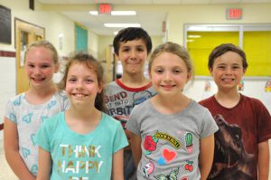 Five elementary aged children posed for phote