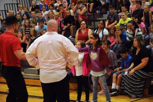 A pair of Fort Plain students role play in the Heroes and Sweethearts presentation.