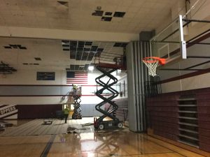 construction equipment in a school gym