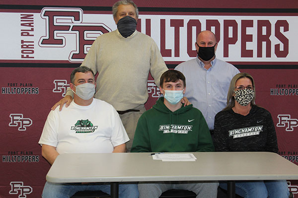 Troy with his coaches and parents 