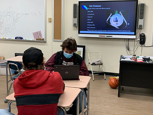 Living Environment students work on an asteroid project