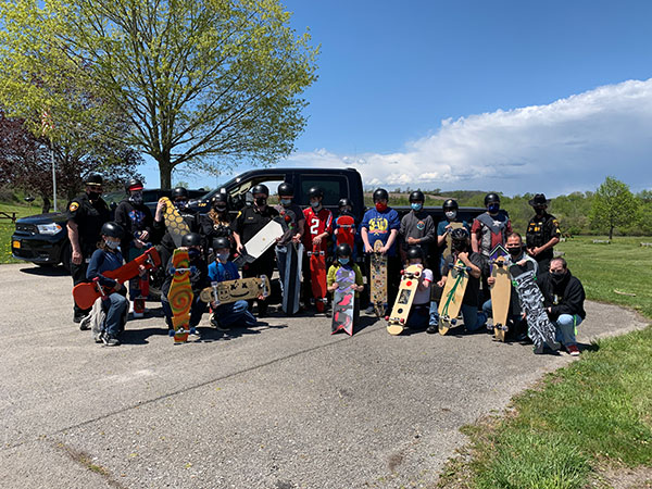 students with their helmets boards and Sheriffs