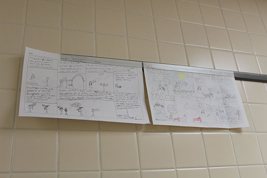 comics hanging on the wall in school hallway
