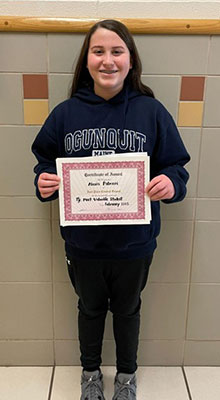 Alexis Palmeri holding her certificate