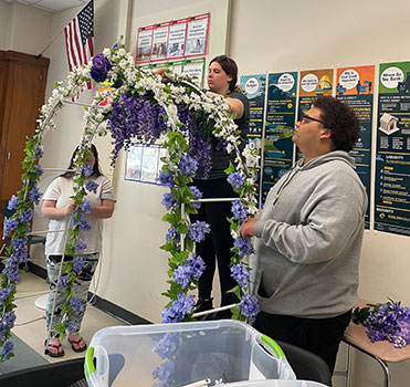 Students working on arch