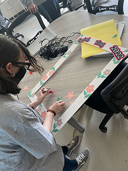 student working on selfie frame