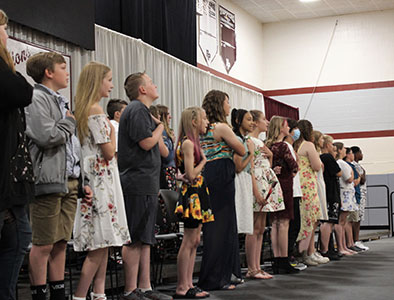 students saying the Pledge of Allegiance