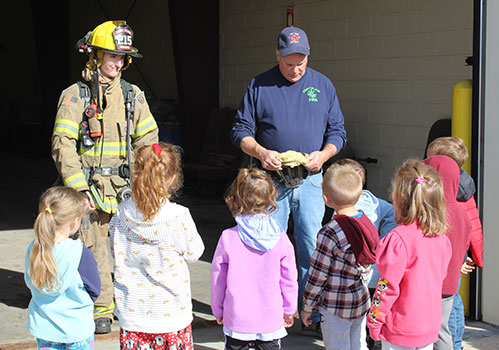 firefighters and students