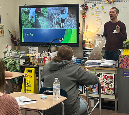 Brad Bower talking to students in a classroom