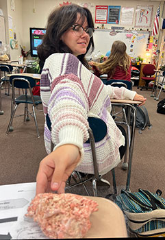 person holding a mushroom