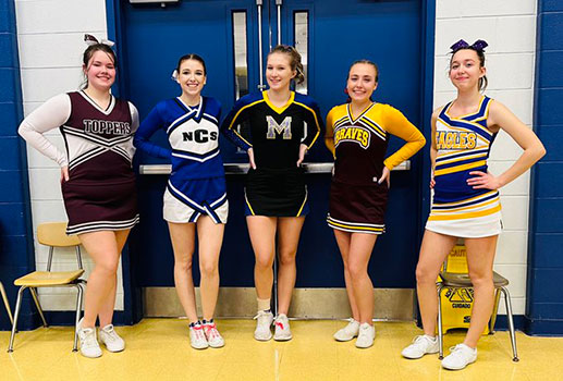5 cheerleaders in a group